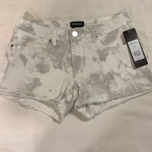 bebe Size 26 logo mix print denim shorts.  Tie dye look NWT
